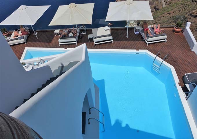 The pool and adjoining sun terrace offer excellent caldera views.