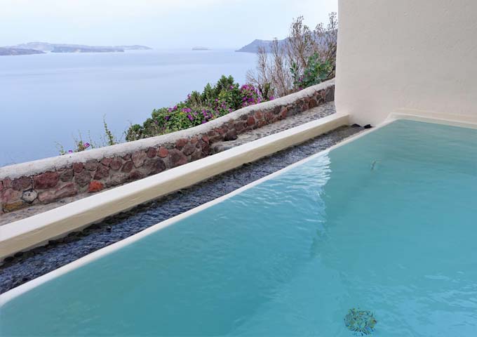 The romantic villa has a private outdoor infinity pool as well.