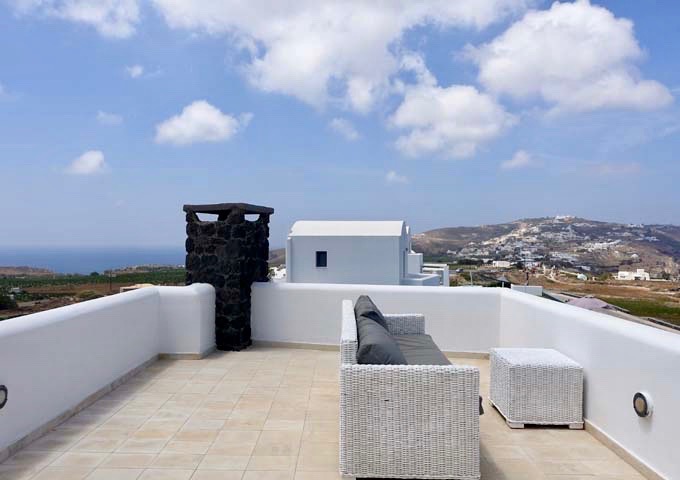 The terrace offers vies of the vineyards and the Aegean Sea as well.
