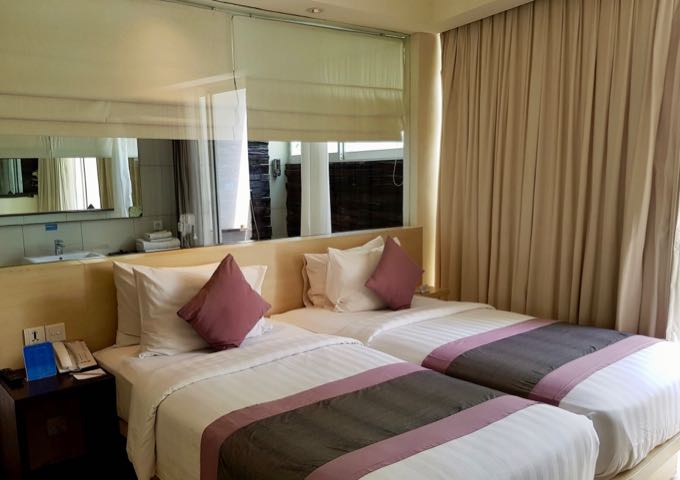 The comfortable rooms have full-length windows.