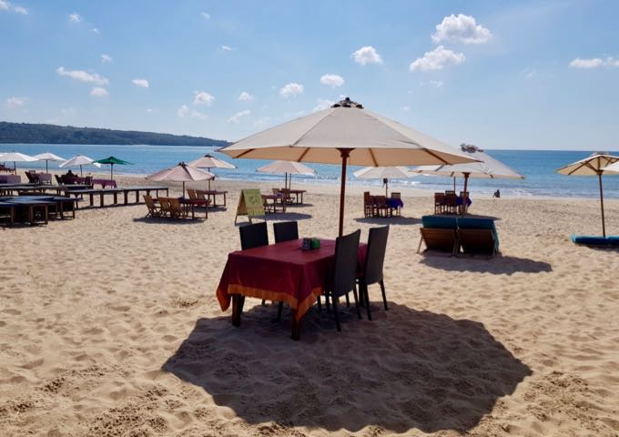The beachside cafes offer sunset dinners on the sand.