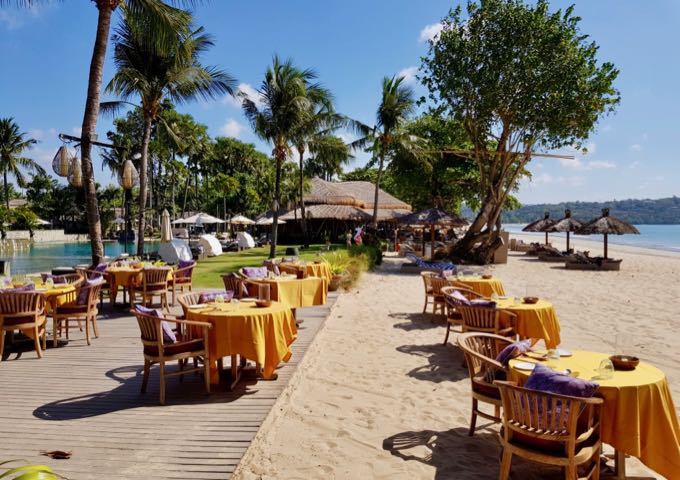 The Nelayan Restaurant offers romantic dining over the sand.