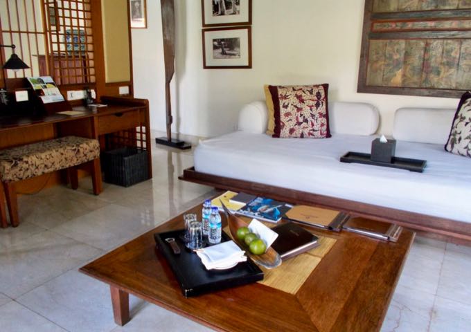 The living areas of the villas are decorated with Balinese arts and crafts.