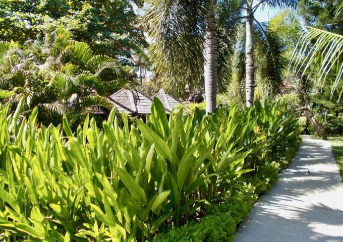 The secluded villas are accessible by lovely garden paths.