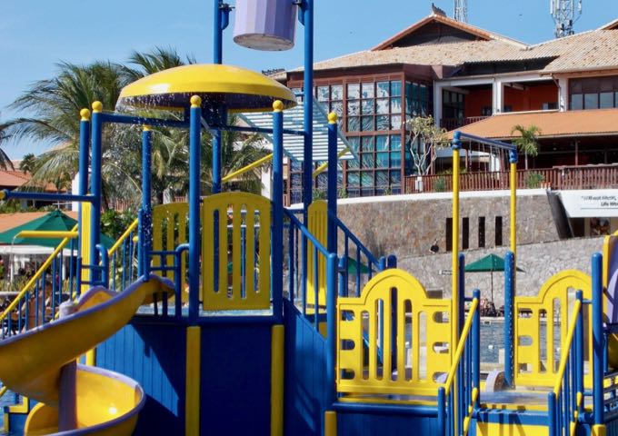 The resort playground is located in a pool.
