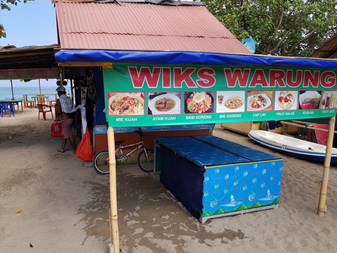 The beachside path has several warungs or food stalls.