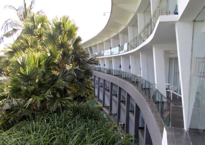The rooms and suites are located in curved blocks which overlook the main pool.