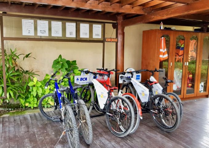 Guests can rent free bicycles and ride along the beachside path.