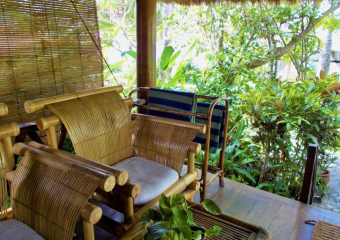 The bungalow porch is well-furnished.