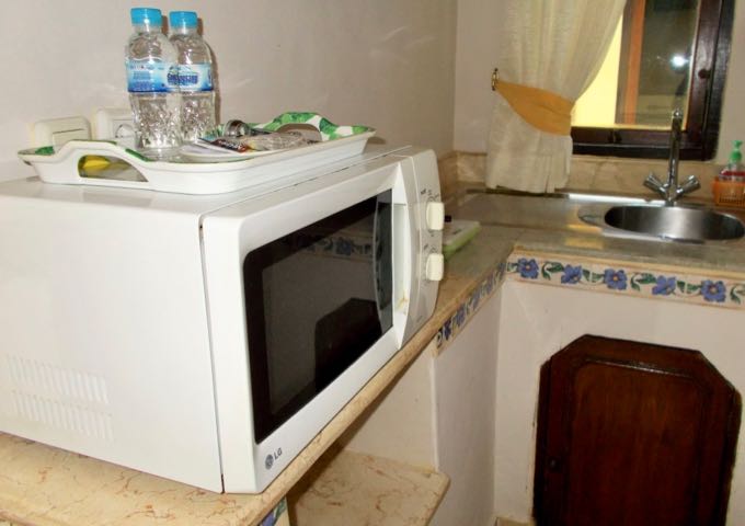 Units feature a small kitchenette with bare necessities.