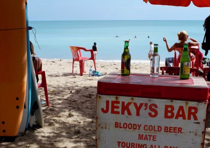Kuta Beach offers plenty of options to rent surfboards or enjoy beers.