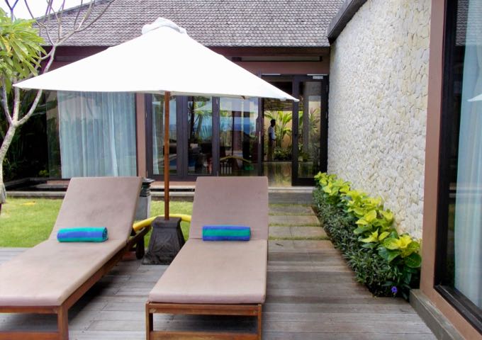Villas have a large private garden for guests to relax in.
