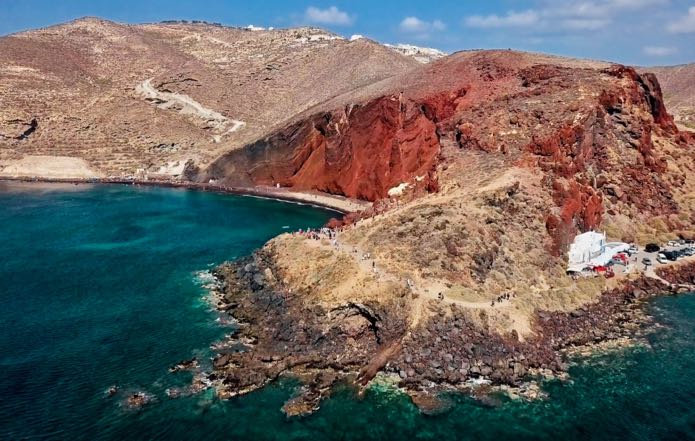 View of Santorini Beaches on private helicopter transfer from Mykonos to Santorini.