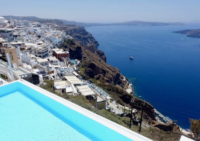 Once can see Fira, Akrotiri, and the volcanoes to the left of the pool.