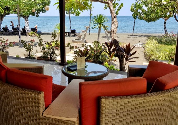 The bar offers comfortable chairs with sea views.