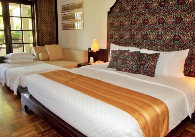 The spacious suites sport a Balinese decor.