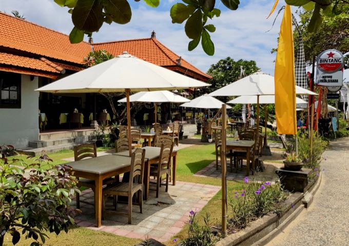 Warung Yasa Segara café nearby is accessible by the beachside path.