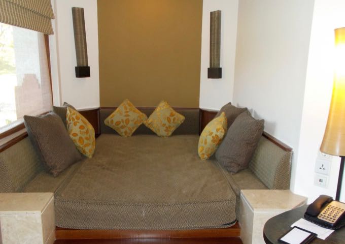 Some suites offer a corner alcove with a sofa bed.