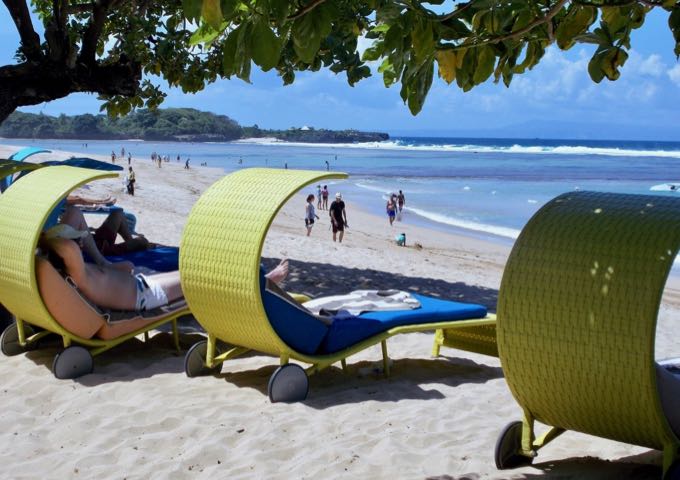 The resort offers funky lounge chairs on the beach.
