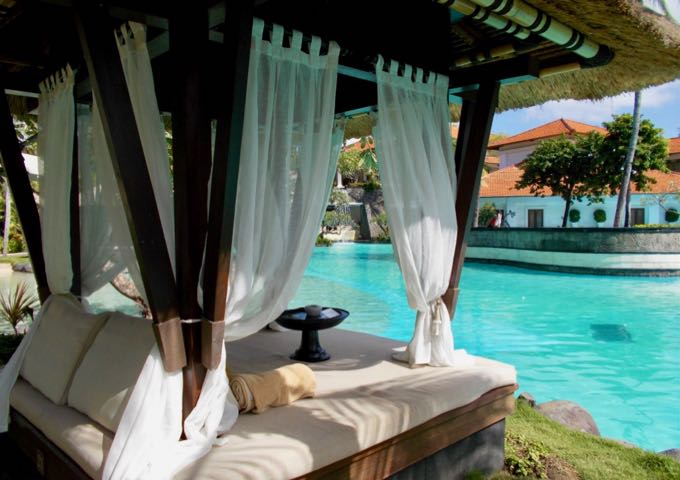 The poolside gazebos are great for relaxing.