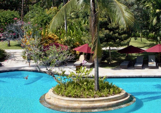 The huge main pool features islands of palms.