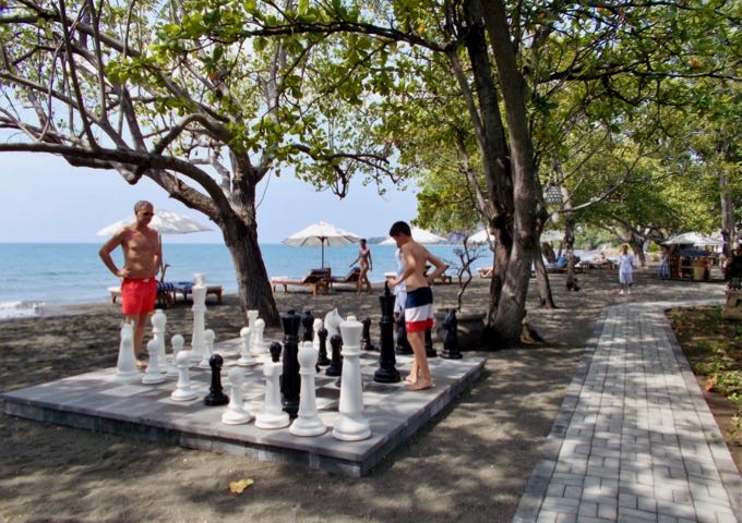 The beach offers plenty of shade and games like outdoor chess.