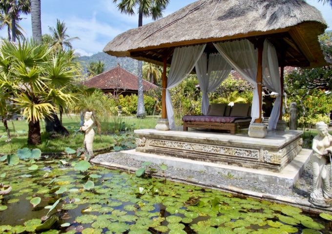 The resort's tropical gardens have several ponds with traditional gazebos.