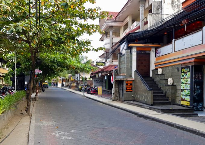 The hotel is located on a side street in the popular tourist region of Legian.