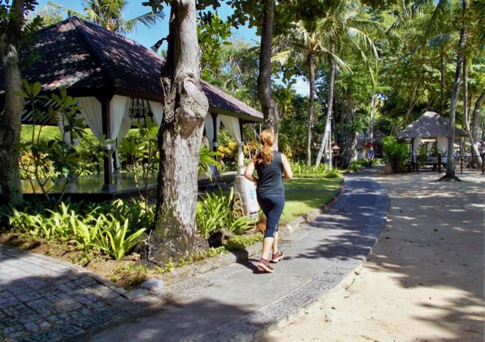 The beachside path leads to shops and cafes in both directions.