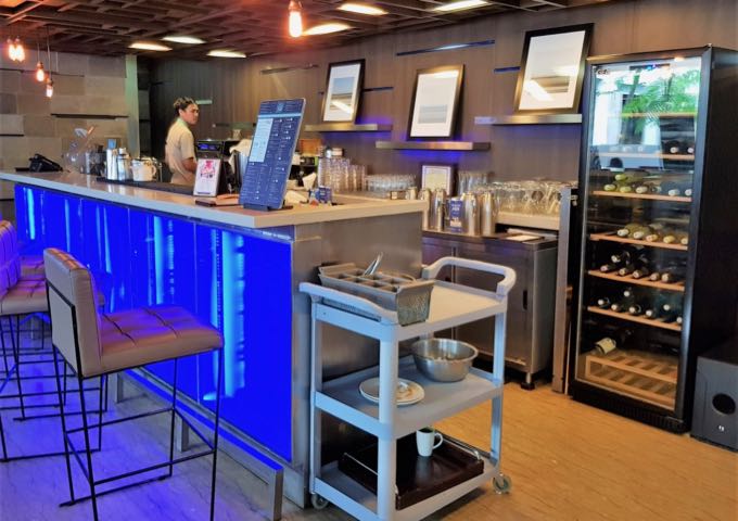 The bright lounge bar is next to the restaurant.