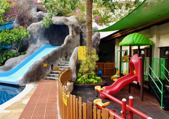 One of the waterslides is by the kids club.