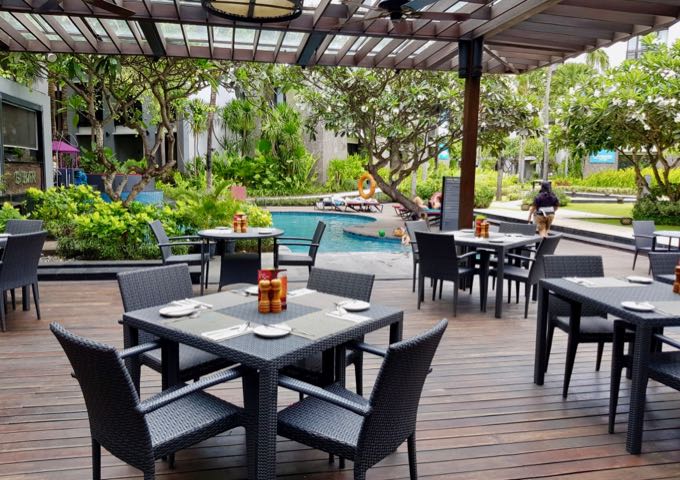The resort restaurant offers poolside seating.