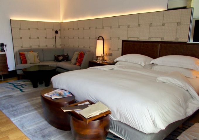 The spacious rooms and suites have a modern decor.