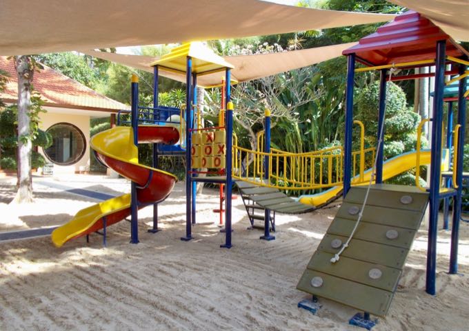 The kids club has a well-shaded playground.