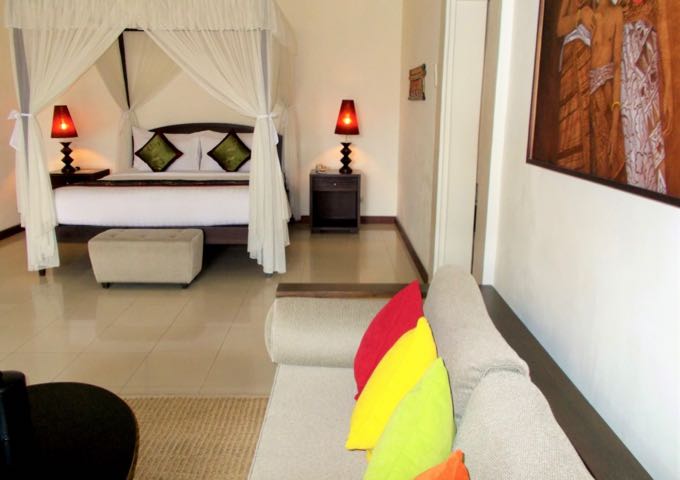 The spacious Deluxe Rooms are beautifully decorated.