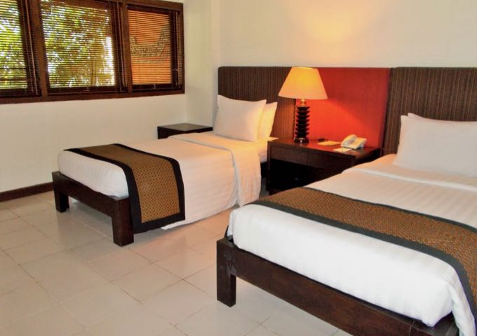 The nicely-furnished rooms feature contemporary Balinese decor.
