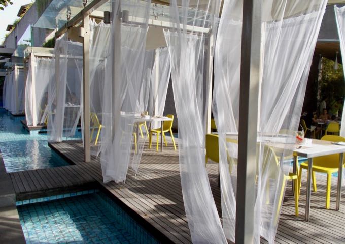 Reef offers poolside seating which is particularly romantic at night.