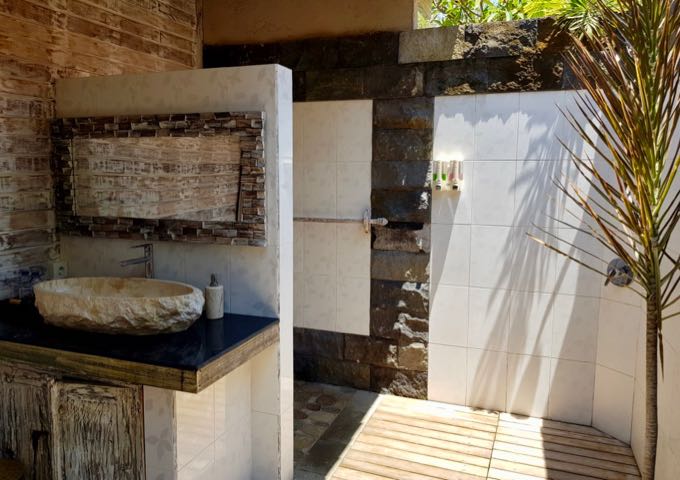 All villas comes with gorgeous outdoor bathrooms.