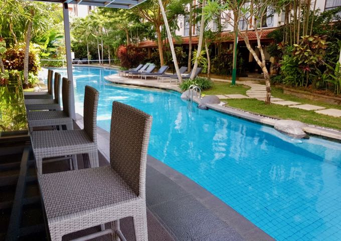 The Pool Bar has plenty of lounge chairs and bar stools by the pool.