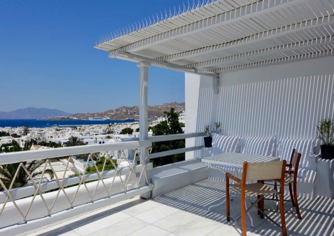 The spacious terrace comes with a dining table and 2 sunbeds.
