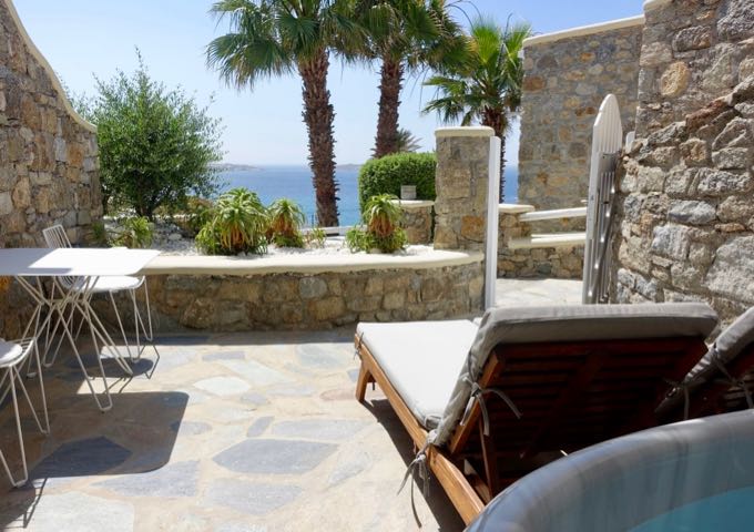 The Honeymoon Suite terrace has an al fresco dining table, 2 sun loungers, and a private jacuzzi.