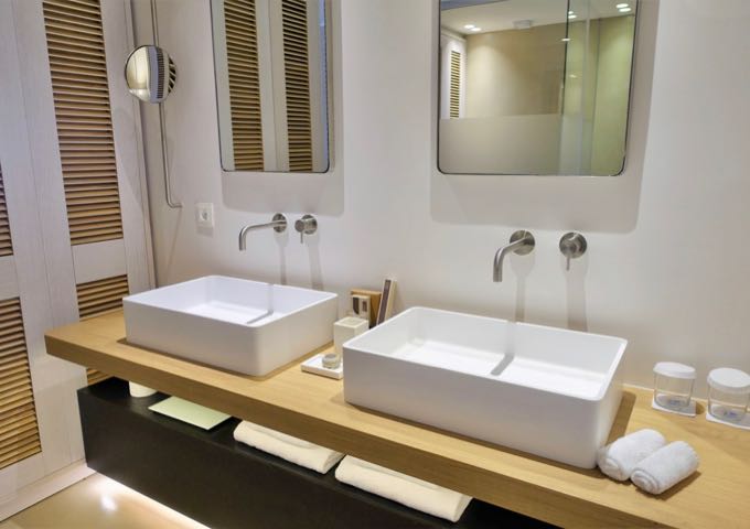 The ensuite bathroom has dual vanities.