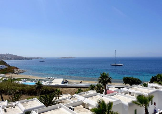 The pool offers panoramic views of Megali Ammos Beach nearby, Kanalia, Ornos, Mpaos Island, and Tinos.