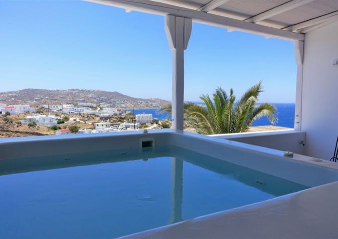 The jacuzzi offers romantic sea views.