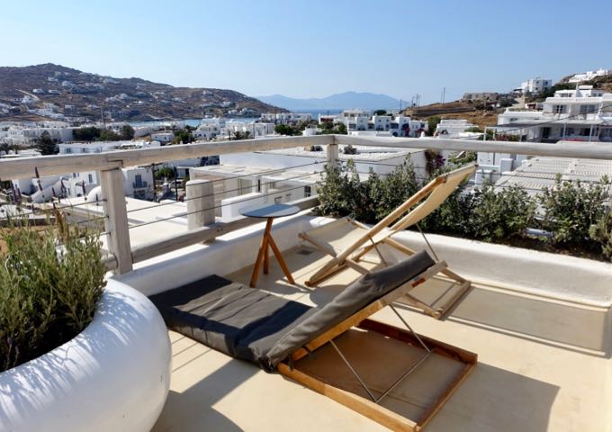 The Vista Suite's balcony offers distant views of Korfos Beach.