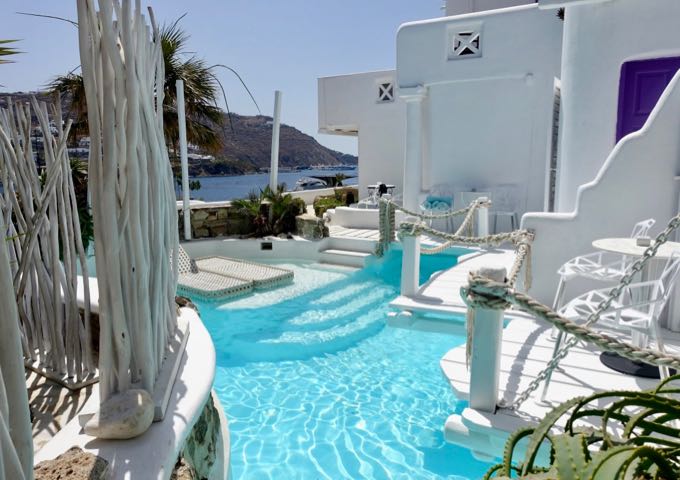 The Royal Two Bedroom Suite has a private pool, terrace, and partially-submerged sun loungers.