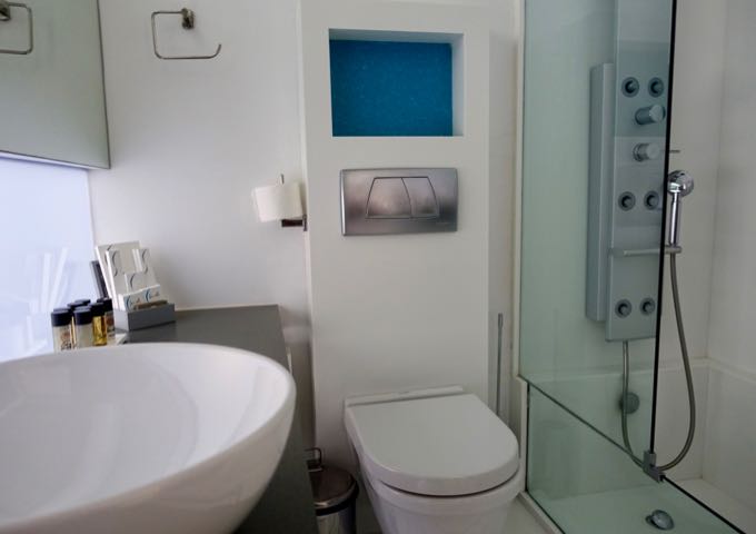 The ensuite bathroom has a hydromassage shower.