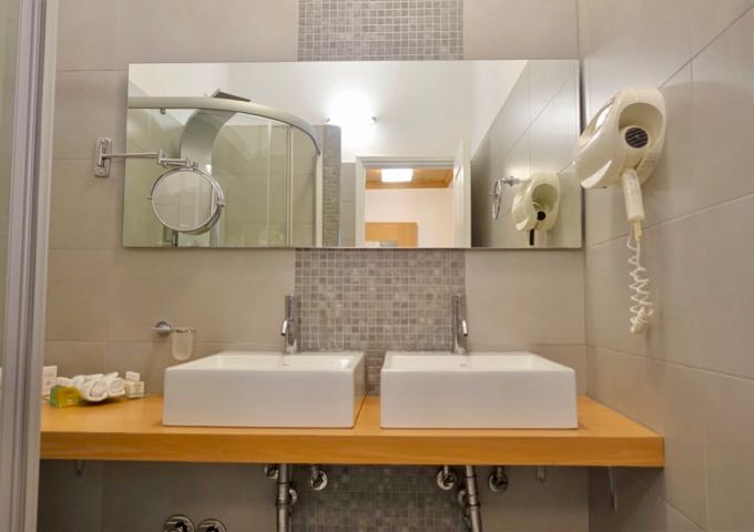 The ensuite bathroom has dual vanities and a hydrotherapy shower.