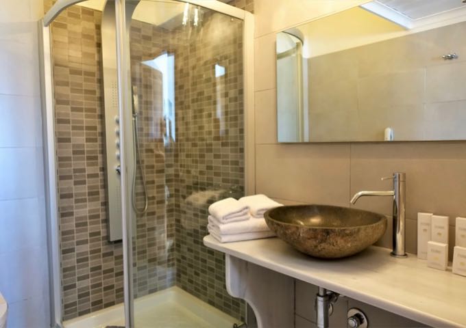 The second ensuite bathroom only offers a hydrotherapy shower and no tub.