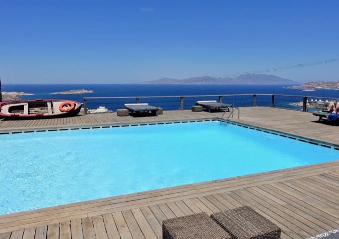 The pool deck also offers view of the 5 Kato Mili windmills and Megali Ammos Beach.